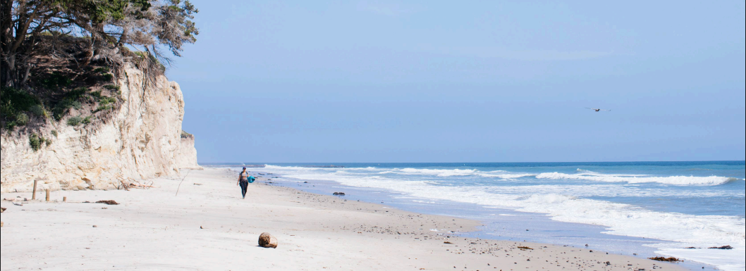 Surfer on UCSB Beach campus