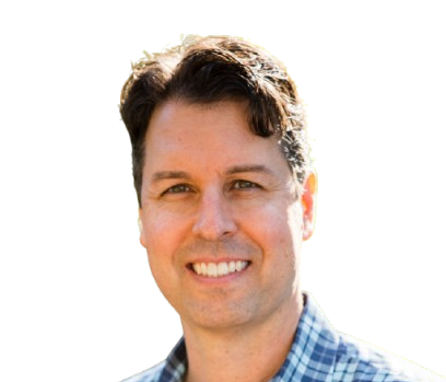 person in professional attire smiling